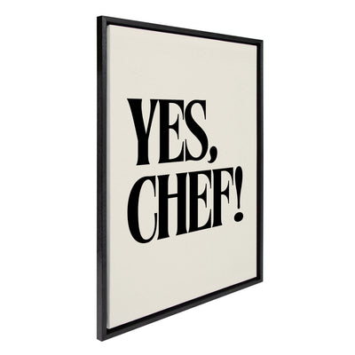 Framed floating canvas art titled 'Yes Chef' by Saint and Sailor Studios shown hanging on a kitchen wall