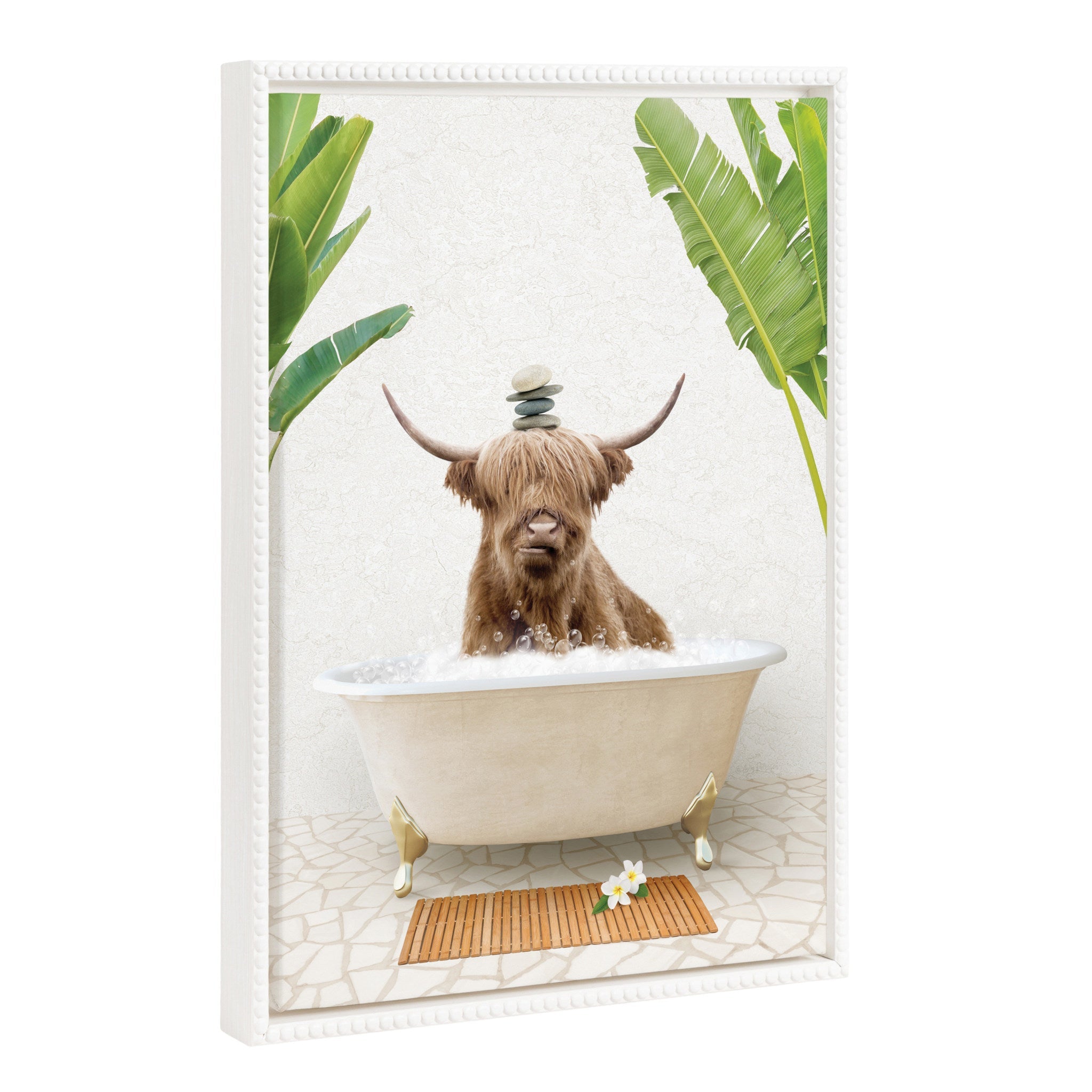 Sylvie Beaded Highland Cow and Stacked Rocks Bali Bath framed canvas art showing a white beaded frame with cow in bathtub and stacked rocks