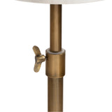 Close-up of an adjustable brass-colored metal pole with a wingnut clamp mechanism for height adjustment on a table or plant stand.