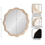 Round mirror with a 1.5-inch thick scalloped light natural wood frame, measuring 28 inches diameter with 25-inch reflective surface, featuring D-ring hangers.