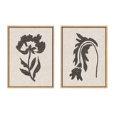 Two framed botanical prints with dark brown silhouetted leaves and flowers on a textured neutral linen background, each featuring a distinct stylized floral shape.