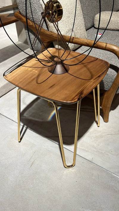 Rectangular resin side table with walnut wood and ivory resin top, shown with various leg color options