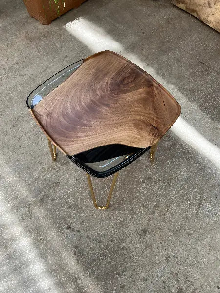 Rectangular resin side table with walnut wood and ivory resin top, shown with various leg color options