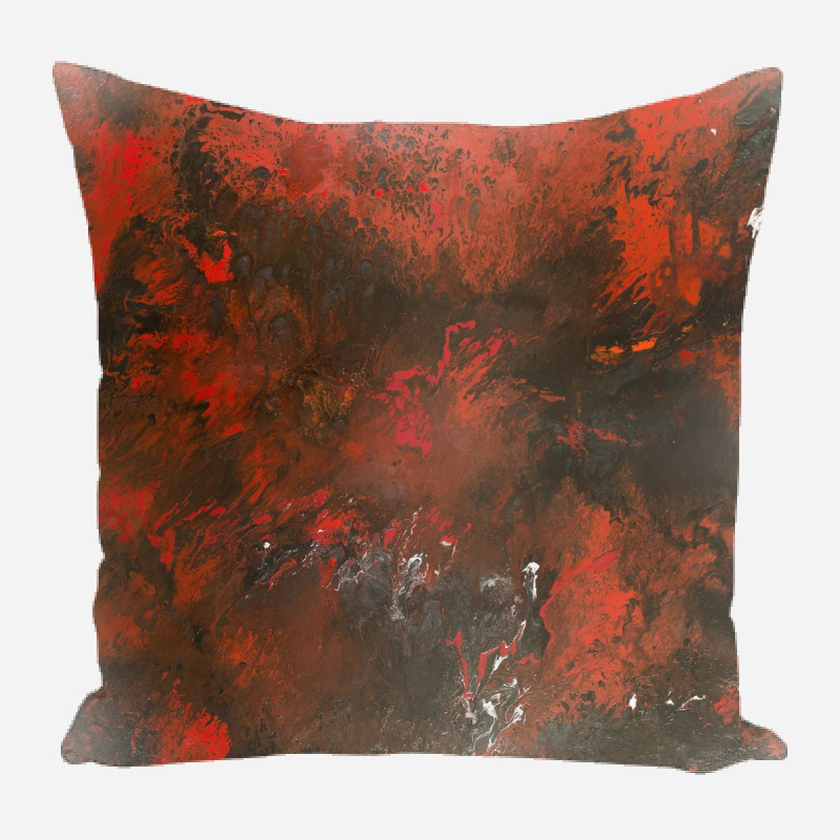 Square pillow with an abstract pattern blending deep reds and blacks with hints of white, creating a fiery, textured effect.