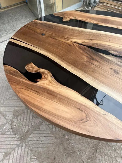 Round epoxy resin dining table with walnut wooden tulip base