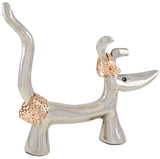 Silver-finished dog-shaped ring holder with stylized upright tail and ears, holding two rose gold filigree rings on tail and ear