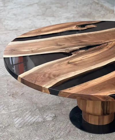 Round epoxy resin dining table with walnut wooden tulip base