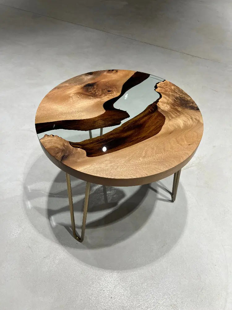 Round walnut wood side table with clear epoxy resin and straight edges