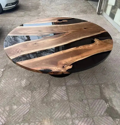 Round epoxy resin dining table with walnut wooden tulip base