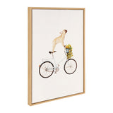 Framed canvas art showing a cream-colored French Bulldog standing on a white bicycle with a flower-filled basket, set against a white background.