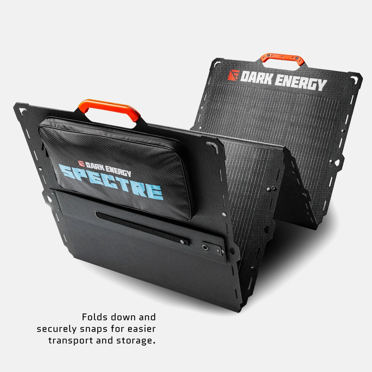 Black dual-panel solar array with orange handles, labeled Dark Energy and Spectre, shown folded in a V-shape with a carrying pouch attached for transport.