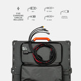 Black solar panel with orange handle laid flat, featuring a zippered compartment containing five different charging cables coiled and labeled with connector types