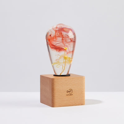 Solar Corona Resin LED Table Lamp with wooden cube base by EP Designlab