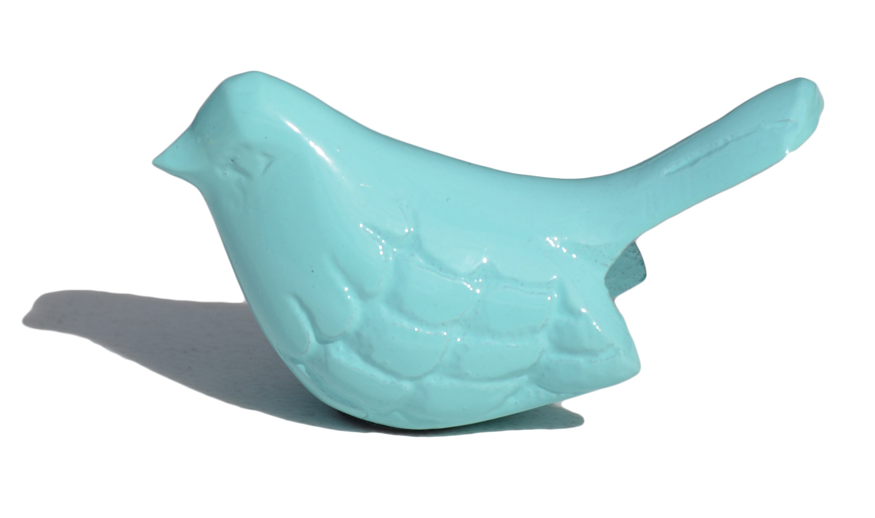 Sea green aluminum Vibhsa bird figurines displayed on tabletop