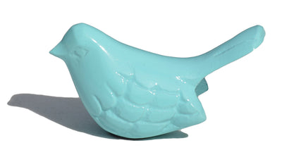 Sea green aluminum Vibhsa bird figurines displayed on tabletop
