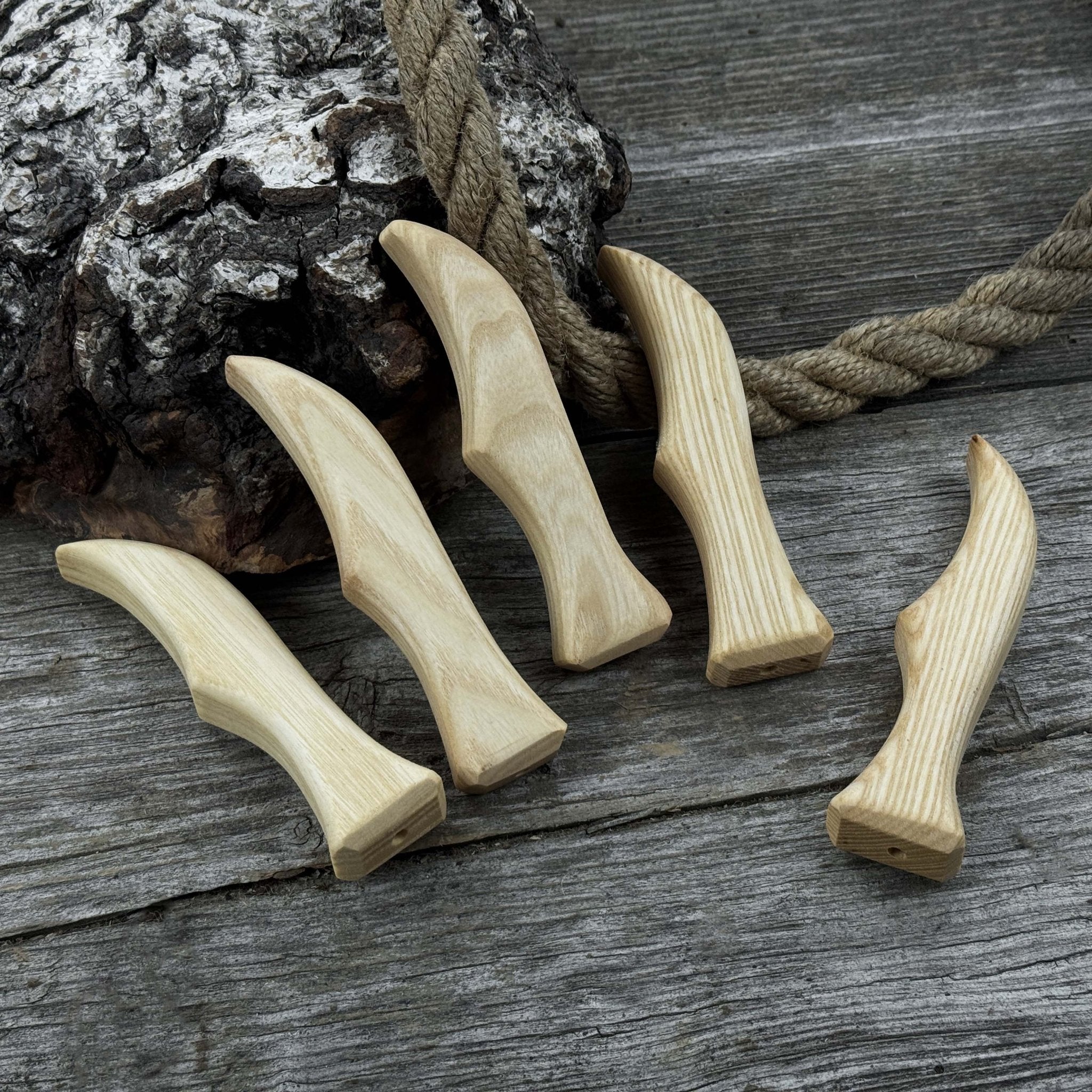 Set of 5 ergonomic ash wood knife handles by Sharky Forged Steel Tools