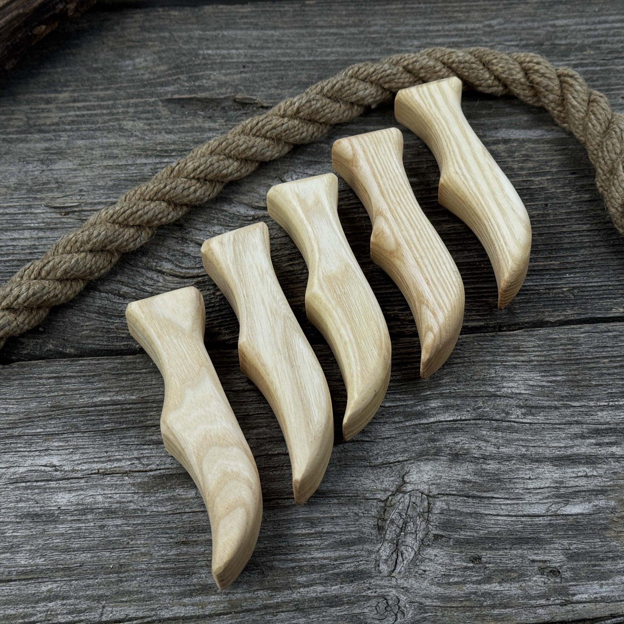 Set of 5 ergonomic ash wood knife handles by Sharky Forged Steel Tools