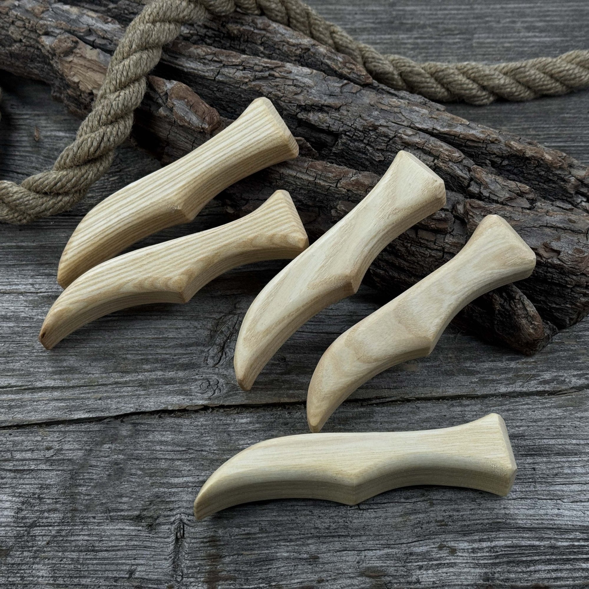 Set of 5 ergonomic ash wood knife handles by Sharky Forged Steel Tools