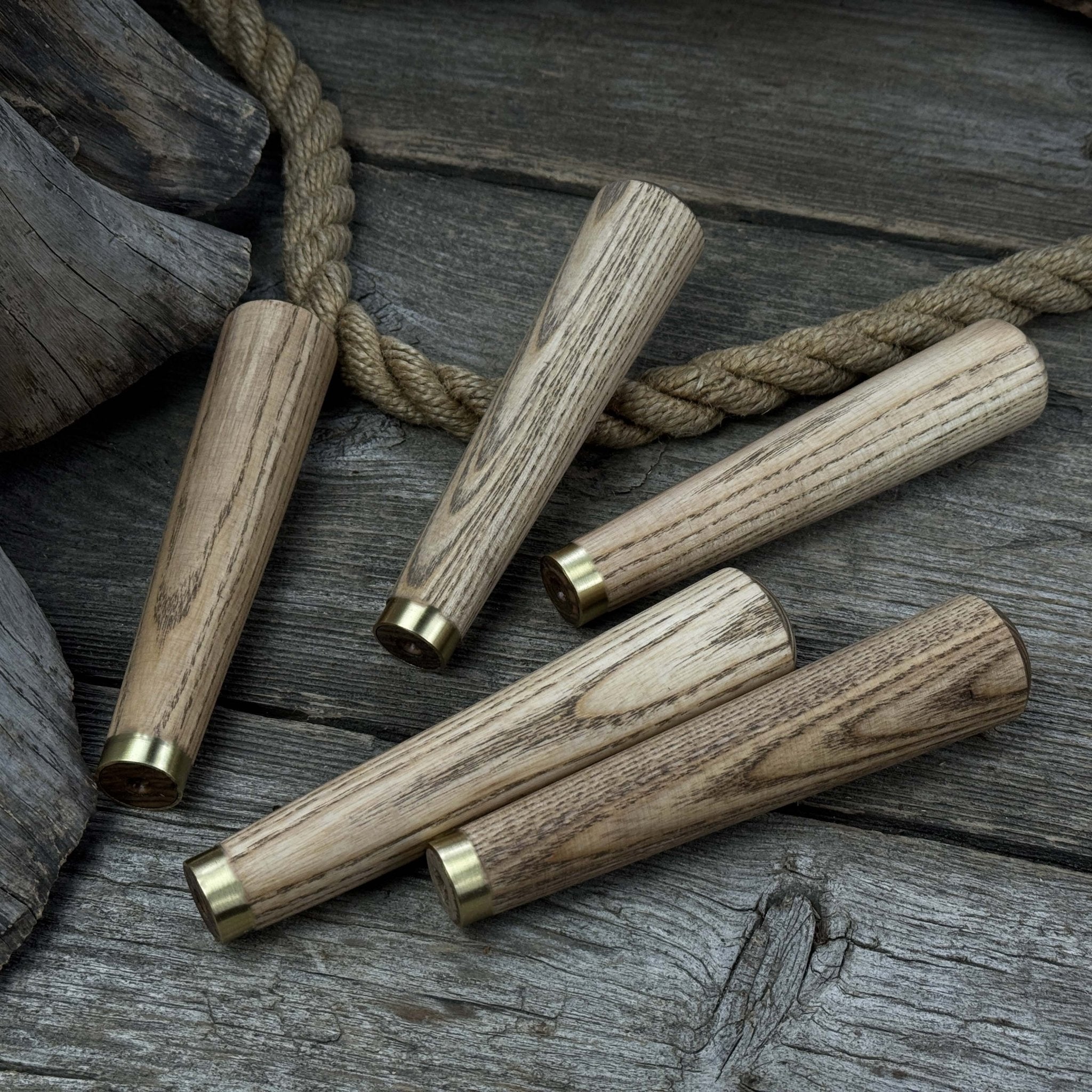 Set of 5 tapered ash wood tool handles with brass rings by Sharky Forged Steel Tools