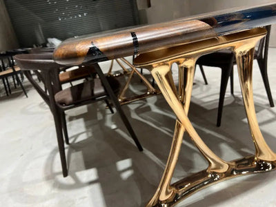 Custom epoxy resin dining room table with walnut wood and rose gold aluminum legs
