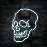 Skull Bone Shape Neon Light Sign glowing against a light neutral wall