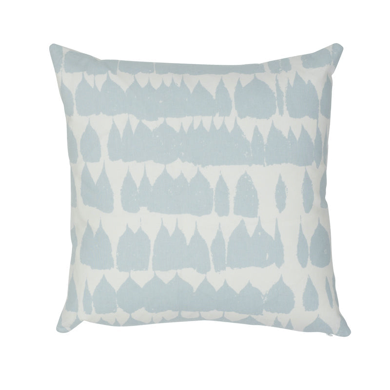 Queen of Spain Pillow Cover featuring sky blue piping displayed on a wooden bench with succulent plants