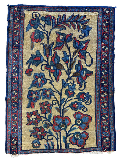 Small antique Persian Malayer Tree of Life rug in warm tones measuring 23 by 33 inches