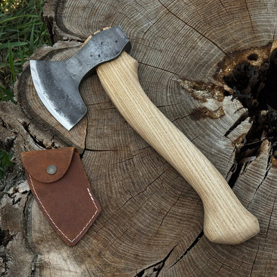 Small hand-forged carving axe with ash wood handle and leather sheath