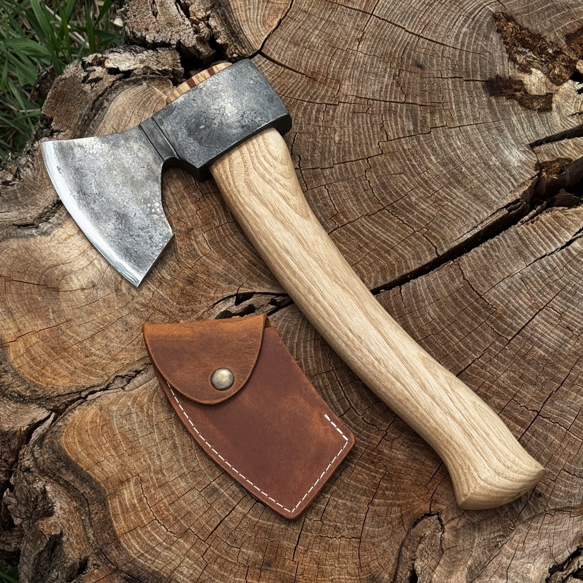 Small hand-forged carving axe with ash wood handle and leather sheath