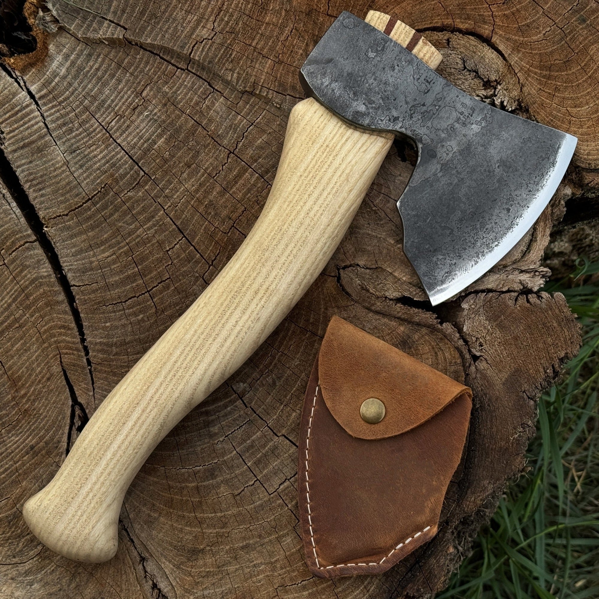 Hand-forged small carving axe with ash wood handle and leather sheath
