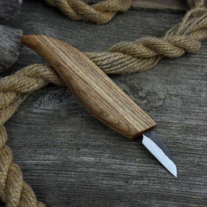 Small whittling carving knife with fine-tipped blade and ergonomic ash wood handle by Sharky Forged Steel Tools
