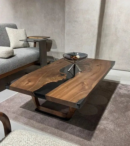 Handcrafted resin coffee table with smoke-colored resin river and solid walnut legs