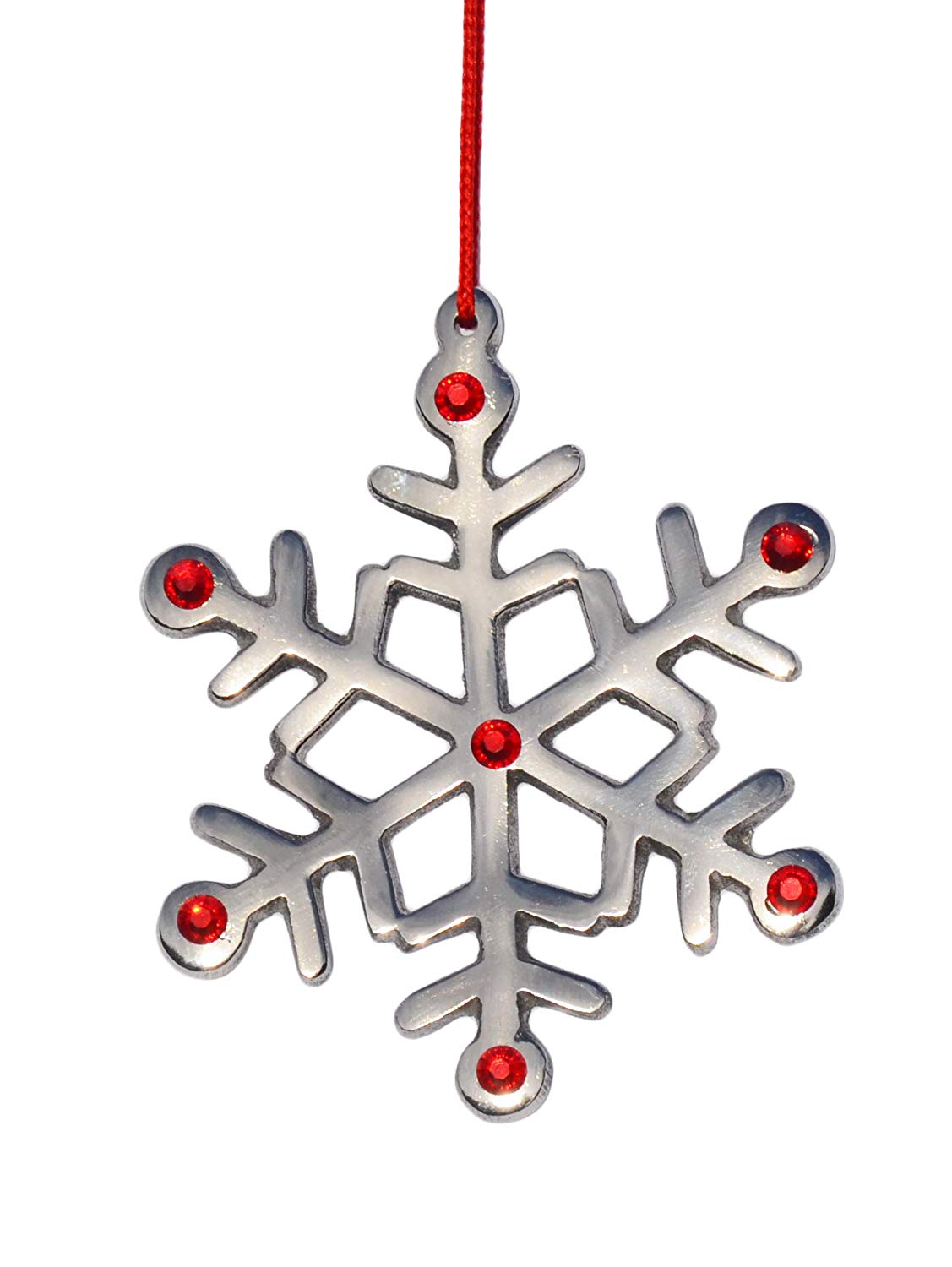 Silver metal snowflake Christmas ornament with six points, decorated with six small red gems and hanging from a thin red string against a white background.
