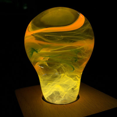 EP Light Solar System Resin LED Lamp with wooden base showing handcrafted resin design