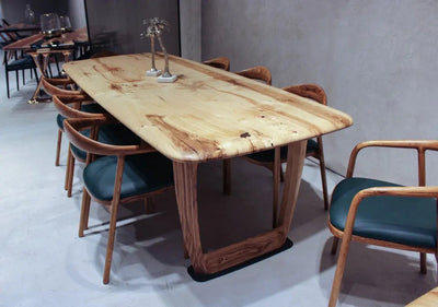 Rustic solid chestnut wood dining table with chestnut legs showing natural grain and knots