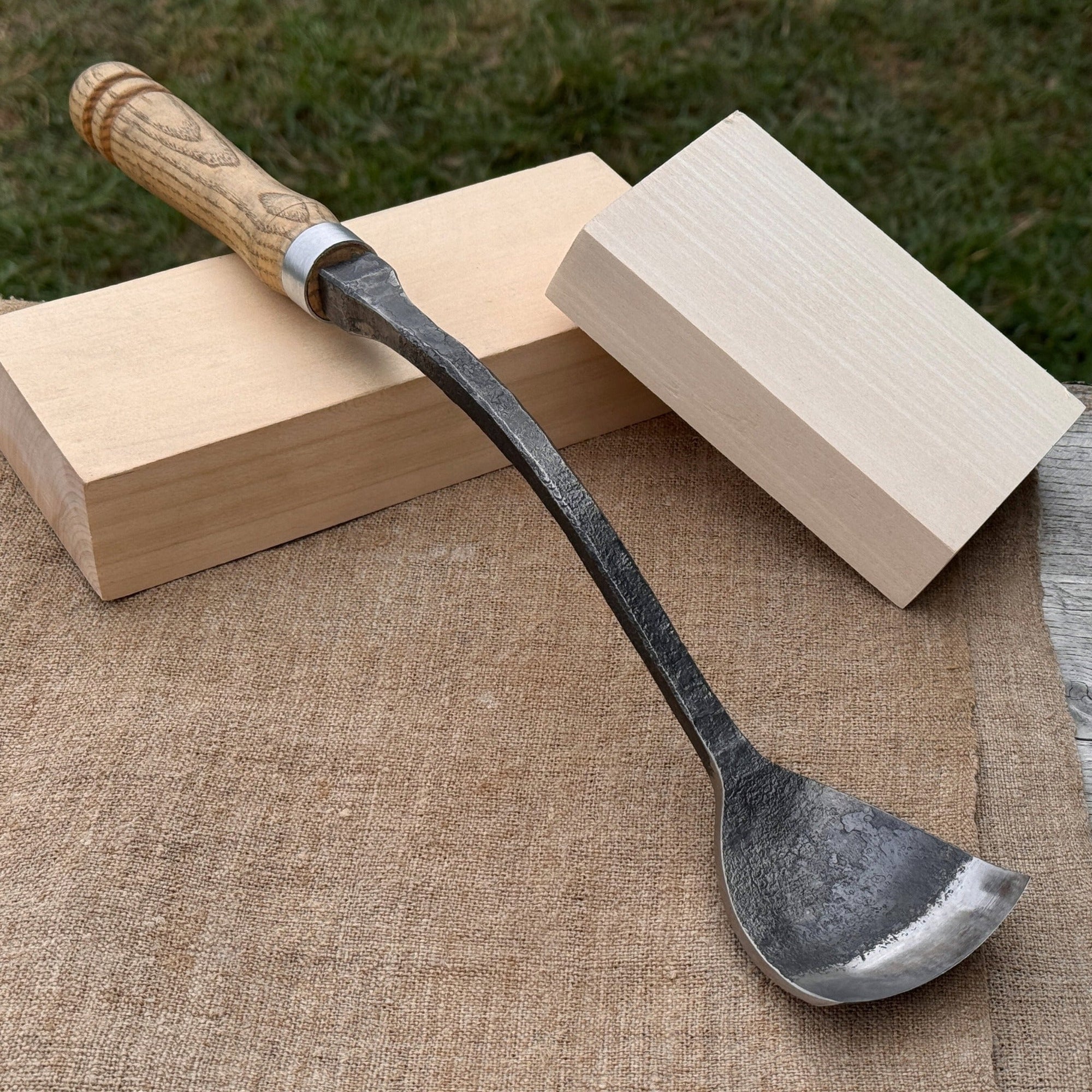 Hand-forged Spoon Bent Gouge woodworking tool with ash wood handle and carbon steel blade