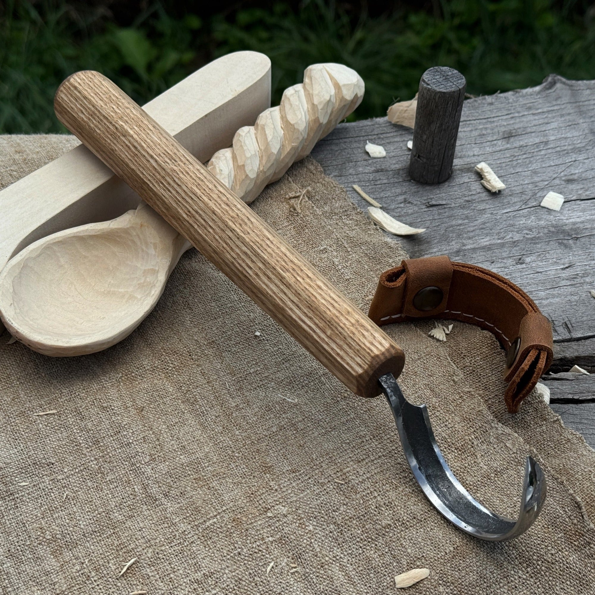 Spoon carving hook knife with large curved blade and ash wood handle by Sharky Forged Steel Tools