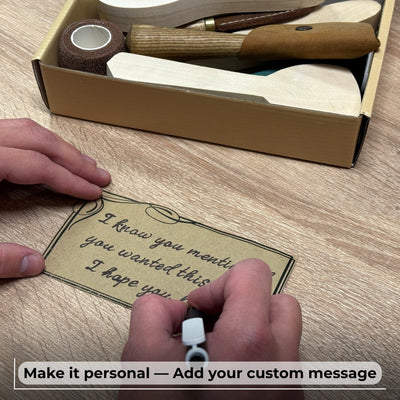 Spoon Carving Kit with wood carving knives, wooden blanks, sandpaper, and sharpening tools