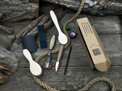 Complete Spoon Carving Kit with wood blanks, hand-forged tools, sandpaper, and accessories