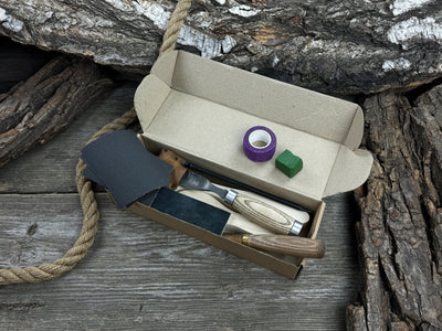 Complete Spoon Carving Kit with wood blanks, hand-forged tools, sandpaper, and accessories