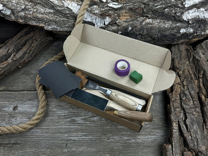 Complete Spoon Carving Kit with wood blanks, hand-forged tools, sandpaper, and accessories