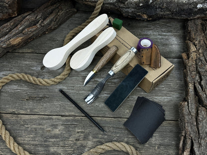 Complete Spoon Carving Kit with wood blanks, hand-forged tools, sandpaper, and accessories