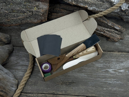 Spoon Carving Kit for Beginners with knives, wooden blank, sandpaper, and sharpening board