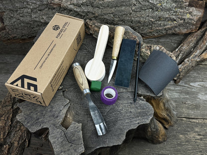 Spoon Carving Kit with knives, wooden blank, sandpaper, sharpening board, pencil, and finger wrap
