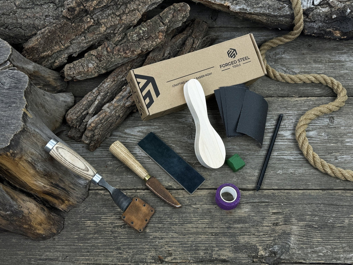 Spoon carving kit with sharpened tools, wooden blank, sandpaper, sharpening board, pencil, and finger wrap