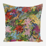 Square pillow with an abstract floral pattern featuring bold brushstrokes in red, green, pink, yellow, and blue on a mixed color background.