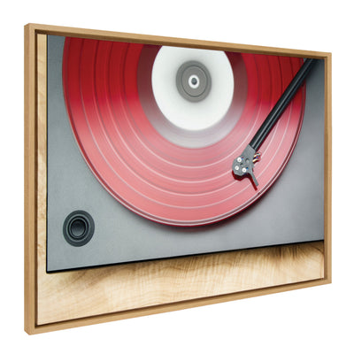 Sylvie Red Vinyl Framed Canvas showing a close-up of a red vinyl record photograph on gallery-wrapped canvas with natural frame.