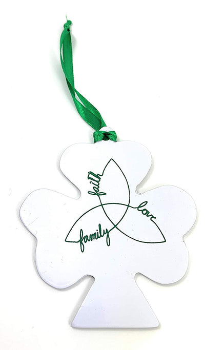 Six ST Patrick's Day Shamrock metal ornaments in white and green hanging with green ribbons