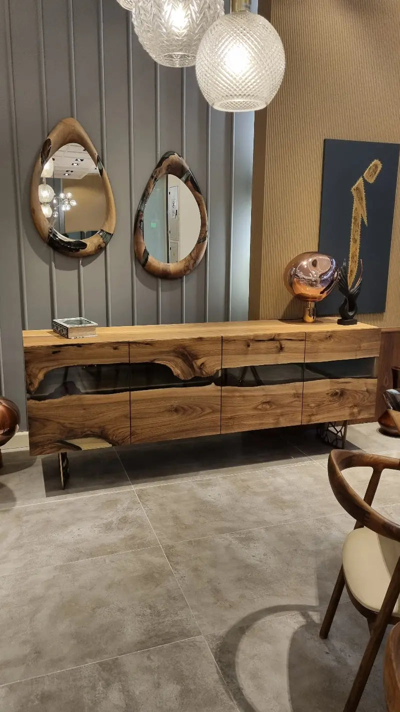 Handcrafted epoxy resin and walnut mirrors in round and teardrop shapes