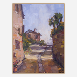 Oil painting of a sunlit stone path winding between warm-toned buildings and a stone wall under a pale blue sky with scattered trees.